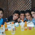 Farah  Ayaad '08 With A Few New Friends During The  Yes  Charity  Meals  Project